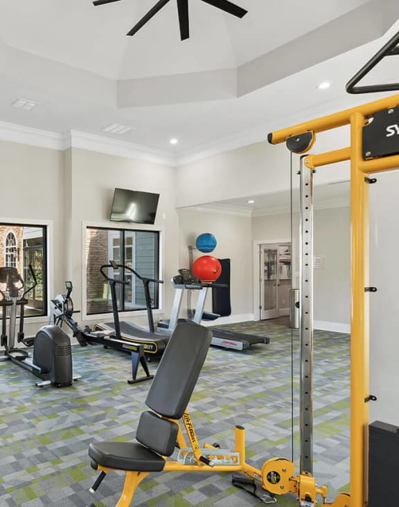 Community Fitness Center with Equipment at Shadow Ridge Apartments in Riverdale, GA-MEDAM.