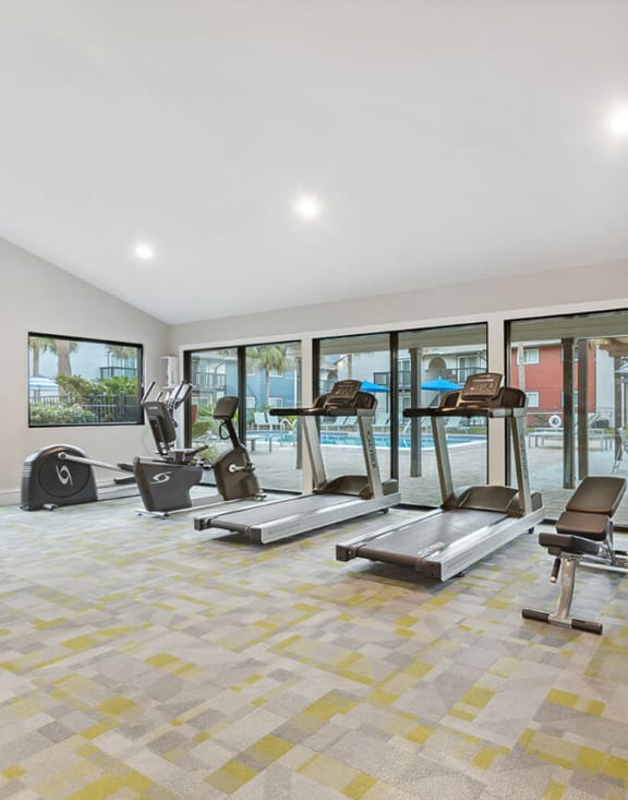 Community Fitness Center with Equipment at Heron Walk Apartments in Jacksonville, FL-MEDAM.