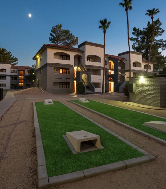 Outdoor Corn Hole Area at Country Club Verandas Apartments located in Mesa, AZ-SMLAM.