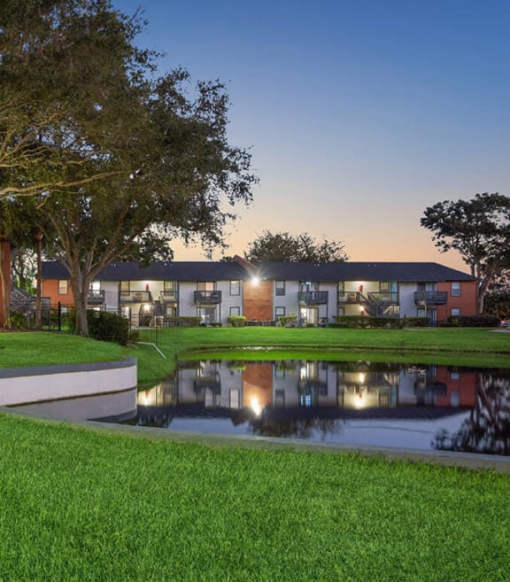 Community Pond and Walking Path at Bridges at Bayside Apartments in St. Petersburg, FL.