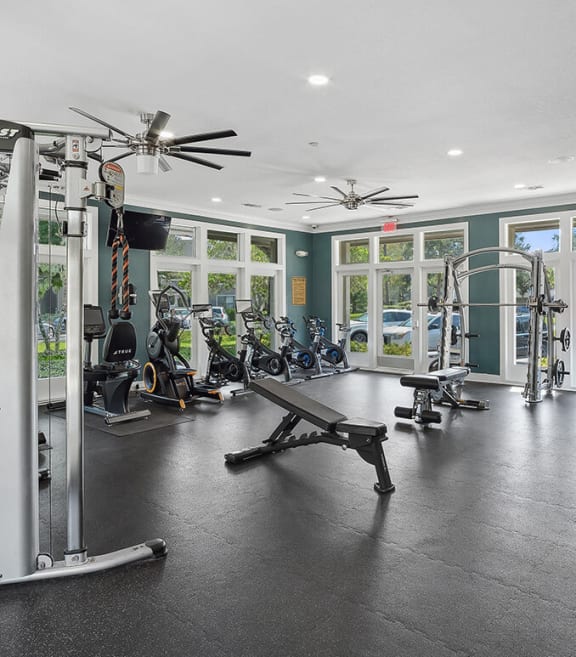 Community Fitness Center with Equipment at Fountains Lee Vista Apartments in Orlando, FL.