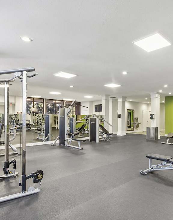 Community Fitness Center with Equipment at Madison Park Apartments located in Anaheim.