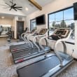 Multiple Treadmills & Stationary Bike At The Fitness Center