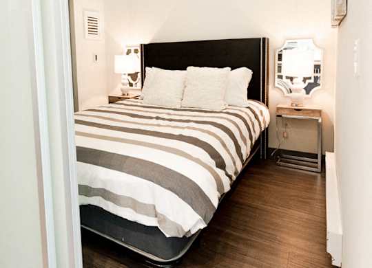 Two Bedroom Apartments in Seattle, WA - Icon Apartments Bedroom with Hardwood Floors and Large Closet at Icon Apartments, Seattle, 98104