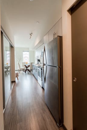 Seattle Apartments - Icon Apartments - Entryway, Kitchen, and Dining Room