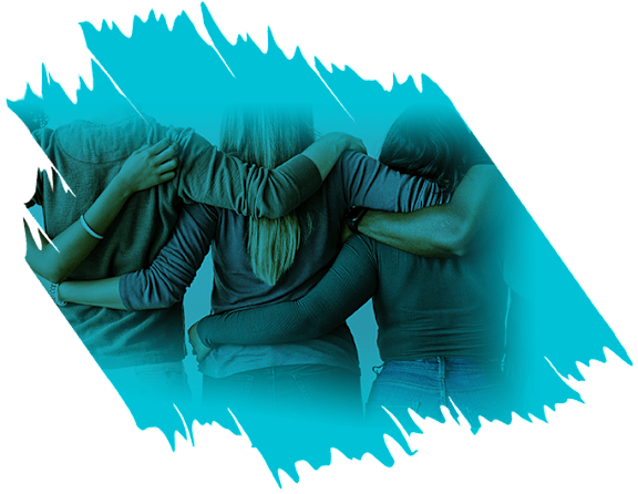 a group of friends hugging with their heads together