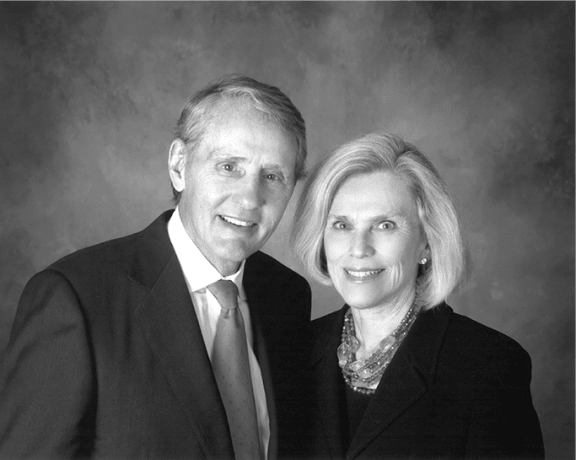 a black and white photo of a man and a woman
