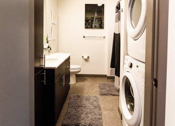 Seattle Apartments - Icon Apartments - Laundry and Bathroom at Icon Apartments, Seattle