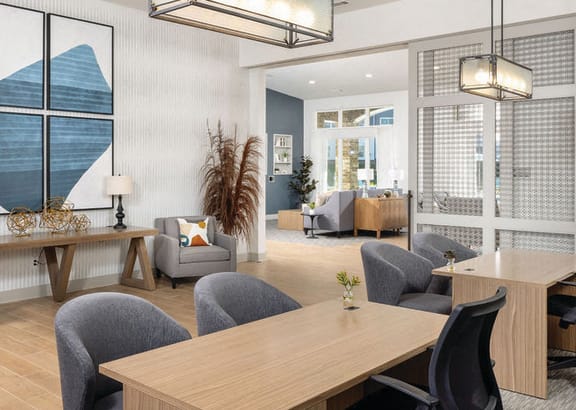 a conference room with a table and chairs at Fairview Springs in Covington, GA, 30016