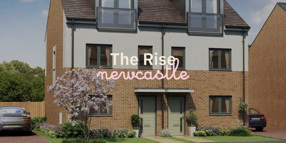 an image of the rise signage on a brick building