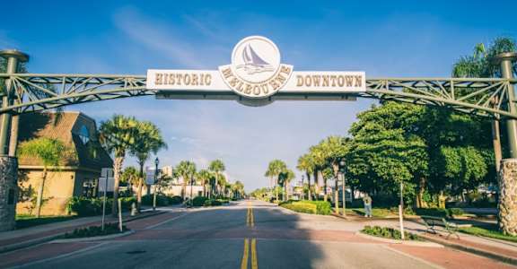 A street sign that says Historic Malabar Downtown. at The Teale New Haven Apartments, Melbourne, FL, 32904