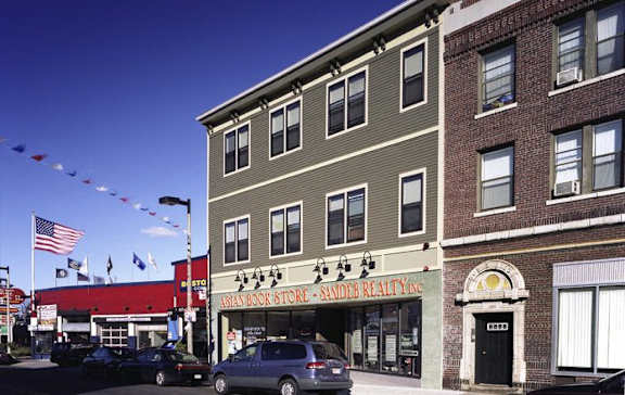 a building on the corner of a city street