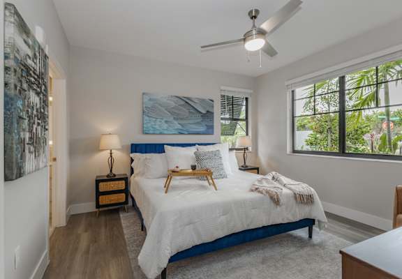 Bedroom with ceiling fan at Portofino Vineyards, Fort Myers, Florida