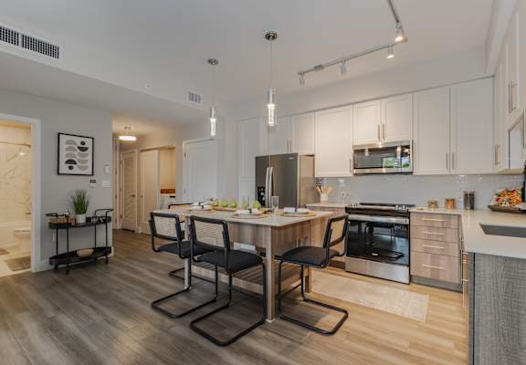Modern kitchen with dining at Portofino Vineyards, Fort Myers