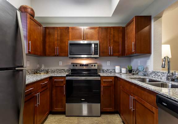 Kitchen with cabinetry at Portofino Cove, Fort Myers, 33916