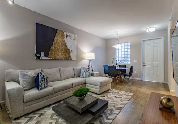 Living room with white couch at Portofino Cove, Fort Myers