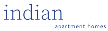 The image is a logo for Indian Hills Apartment Homes.