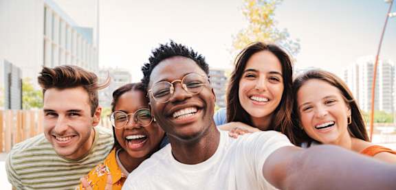 A group of friends taking a selfie together.