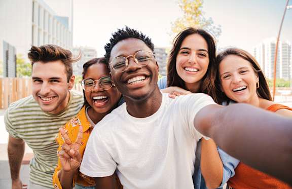 A group of friends taking a selfie together.