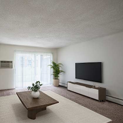 a living room with a couch and a coffee table. Coon Rapids, MN Robinwood Apartments