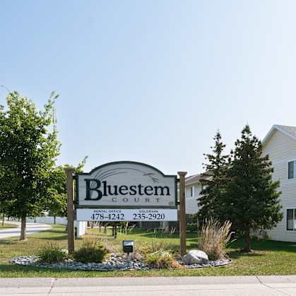 a sign for bluestem court. Fargo, ND Bluestem Townhomes