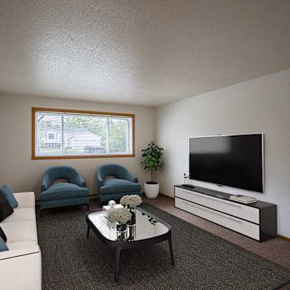 a living room with a couch and a coffee table. Fargo, ND Brownstone Apartments