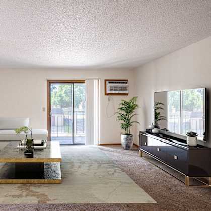 a living room with a large couch, coffee table, tv, and glass sliding door. Fargo, ND Kentwood Manor Apartments