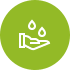 a hand holding two water drops in front of a green background