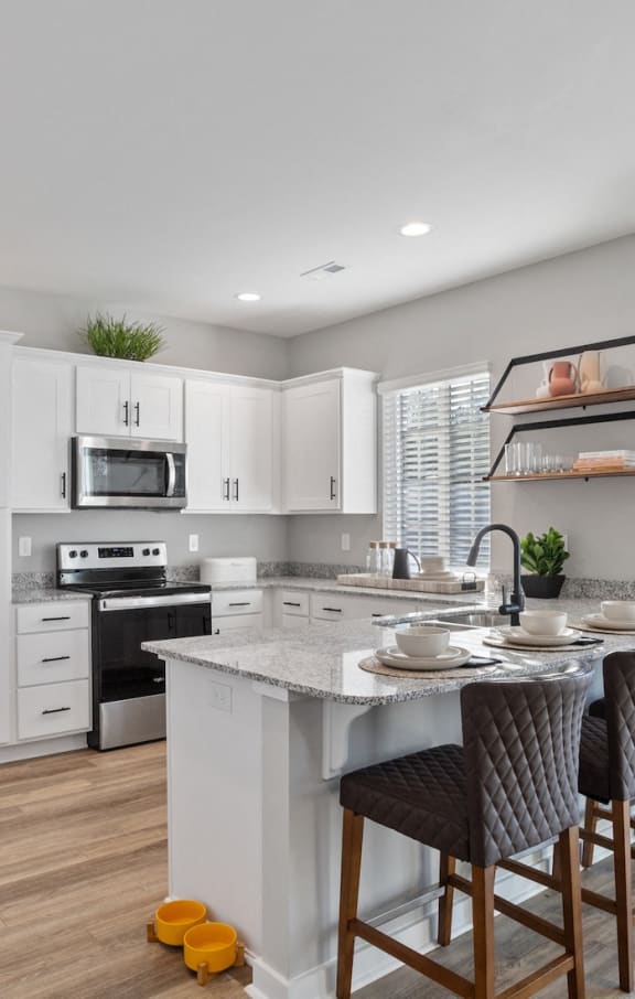 Sanctuary at Indian Creek rental home kitchen with ample counterspace, cabinets, and recessed lighting