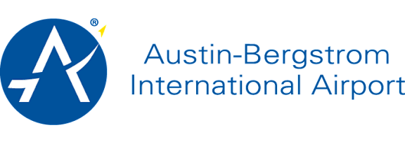 A logo with a white arrow pointing to the right and the words "Austin-Bergstrom International Airport" below it.