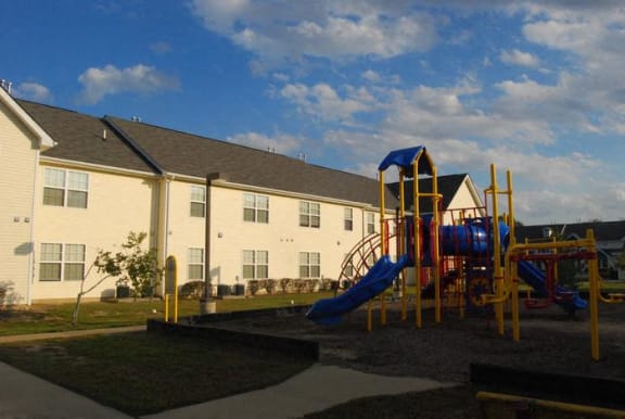 a playground in front of a building