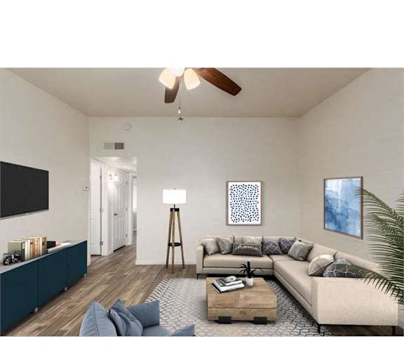 a living room with a couch and a tv
