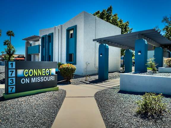 A modern building with a sign that says Connect on Missouri. at Connect on Missour Apartments, Phoenix 85015