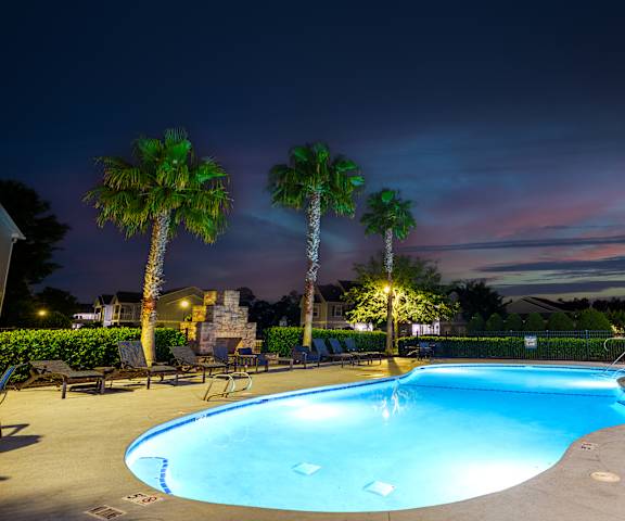 the swimming pool at night at the resort at night