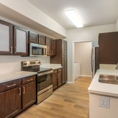 Experience culinary creativity in our kitchen sanctuary at Harvest Park Apartments