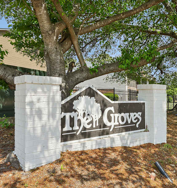 Family is lying down together at The Groves Apartments, Raleigh, 27604