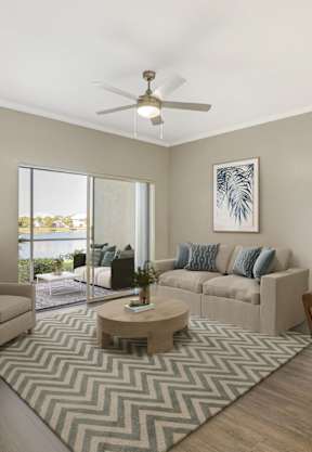 a living room with a couch and a coffee table at Bay Breeze Villas, Fort Myers, FL, 33908