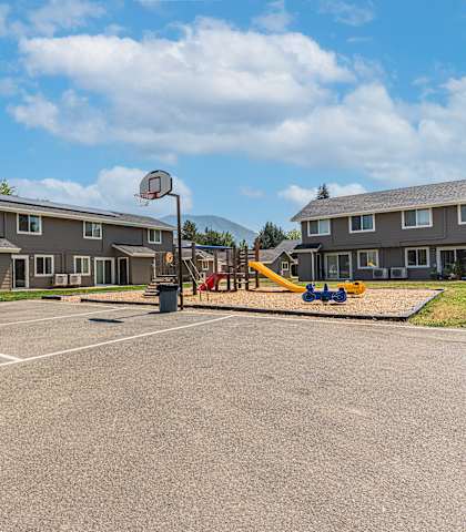 our apartments have a basketball court and playground