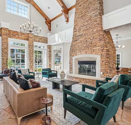 A living room with a fireplace and a couch.
