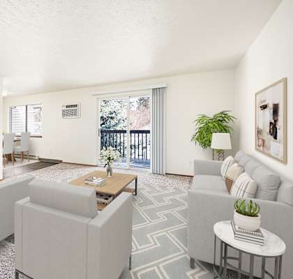 a living room with couches and chairs and a table at Clearwater, Post Falls, ID 83854