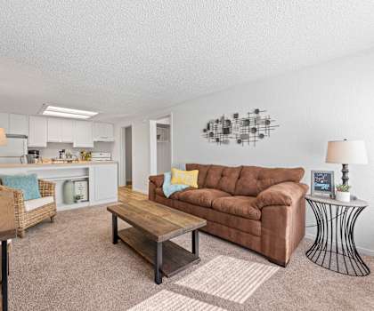 a living room with a couch and a table