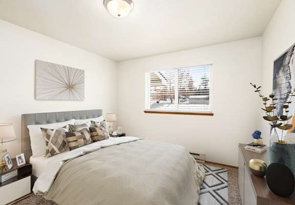a bedroom with a large bed and a window at Clearwater, Post Falls, ID 83854