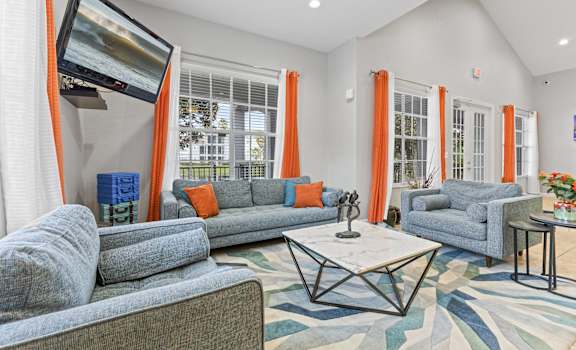 a living room with couches and a coffee table
