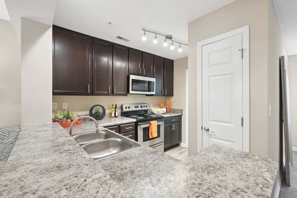 Southern Village apartment kitchen with cabinetry - Chapel Hill, NC