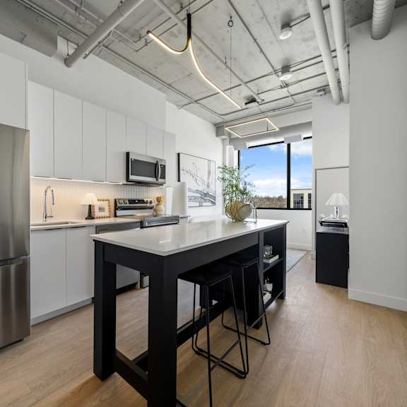 Bright Kitchen with White Counter at Richmond Square, Ontario, N6A 5M8