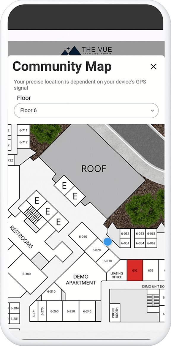 A digital community map showing the layout of a building with labeled rooms and a blue pin marking a specific location.