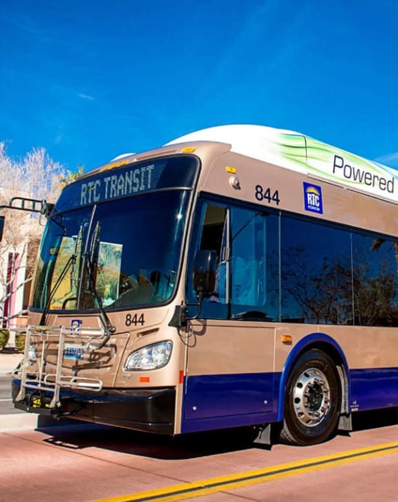 a bus is parked on the side of the street