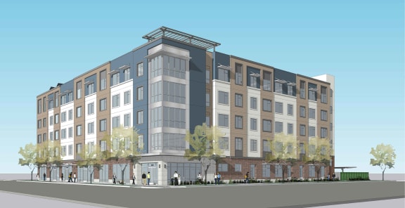a rendering of an apartment building on a city street