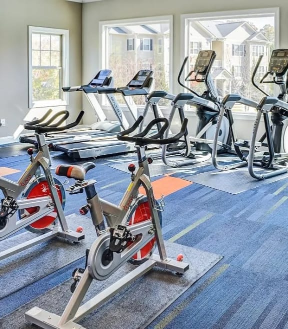 a gym with a lot of exercise bikes in it at The Atlantic River West, Atlanta, GA, 30336