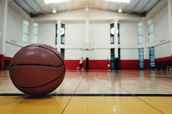a basketball hoop with a red ball in it